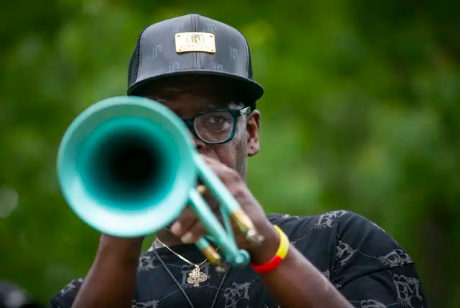 New Orleans musician Dave Washington plays